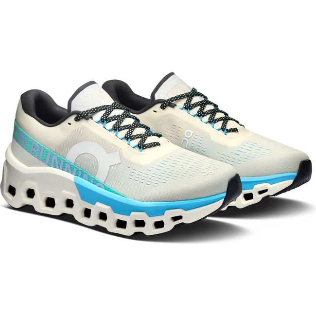 Pair of On Running Women's Cloudmonster 2 Running Shoes in cream and horizon blue