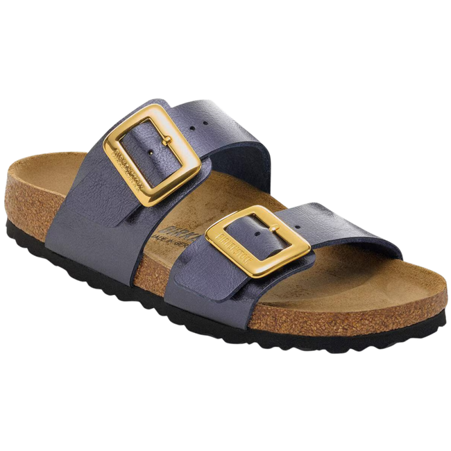 Angled side of Birkenstock Women's Sydney Luxe Birko-Flor Sandal in Midnight Blue