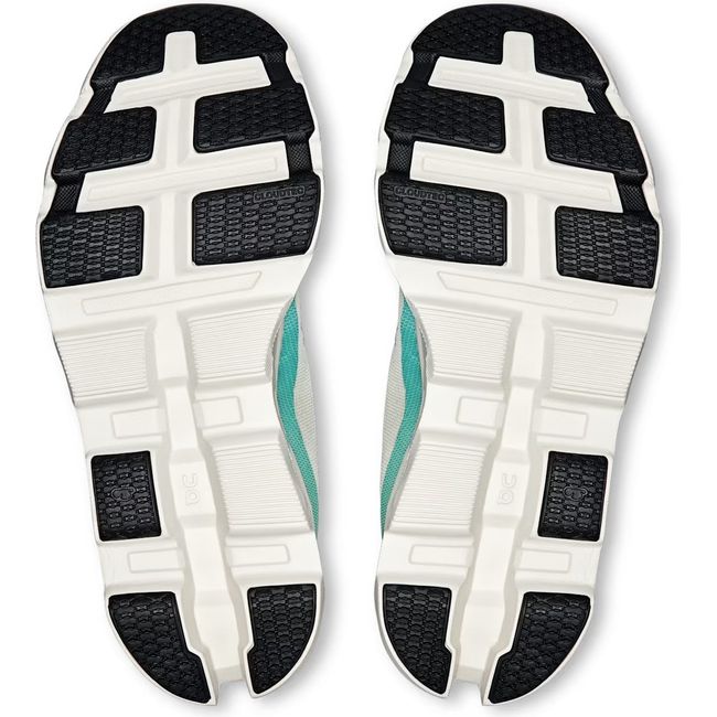 Soles of On Running Women's Cloudmonster 2 Running Shoes in cream and horizon blue