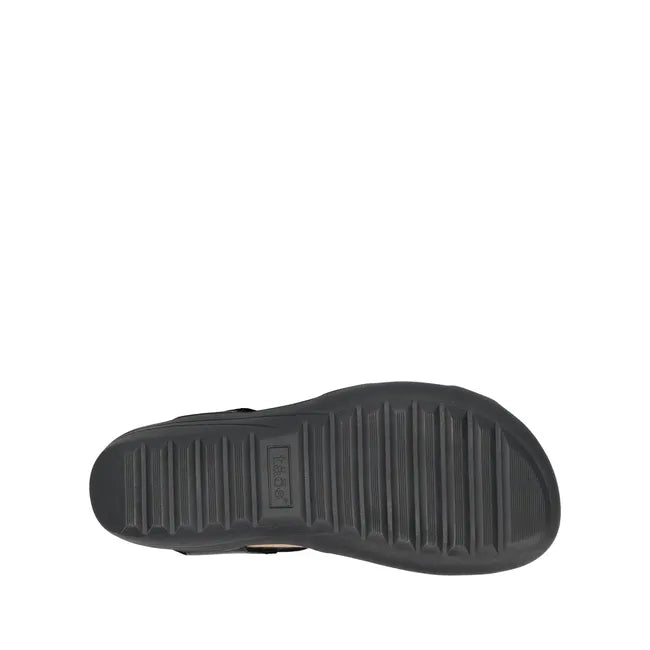Black sole of Women's Taos Serene Sandal in Black leather upper