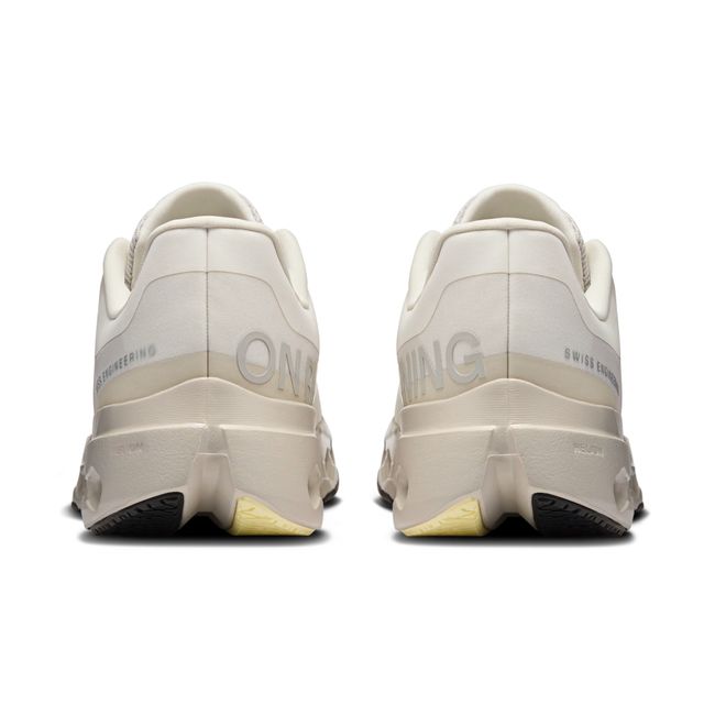 Heels of On Running Women's Cloudsurfer Next Running Shoes in ivory beige and silver
