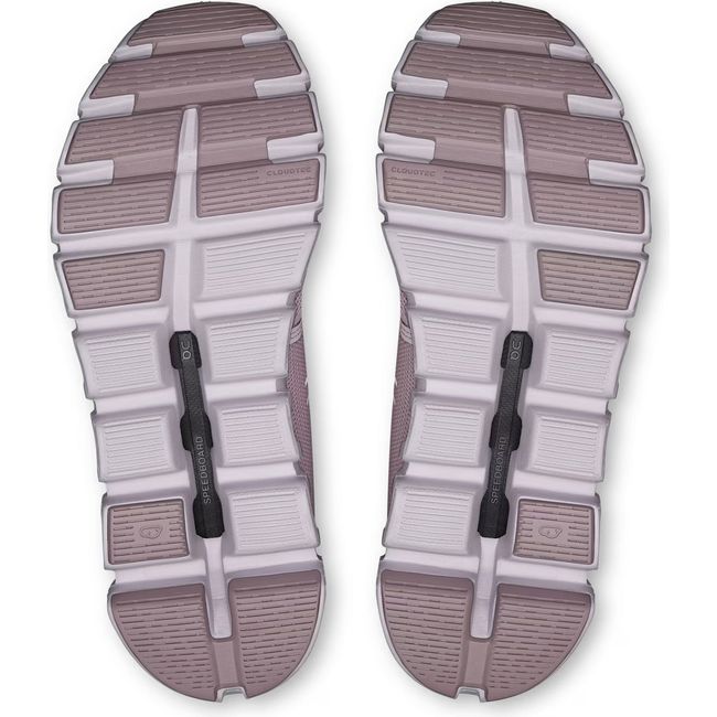 Soles of Women's On Running Cloud 6 Running Shoes in Mauve Orchid with hollow cloud pods for impact
