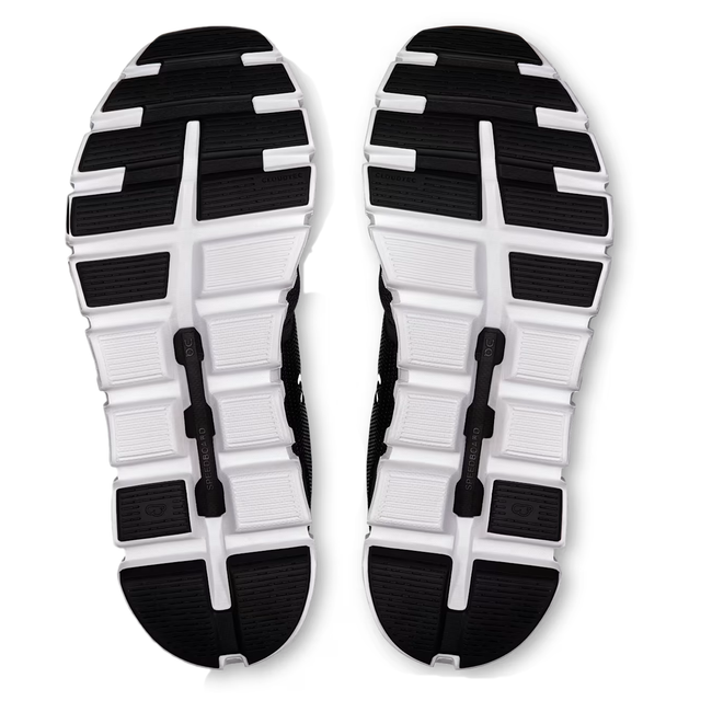 Soles of On Running Women's Cloud 6 Running Shoe in Black and White