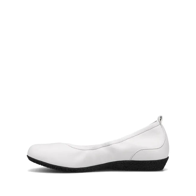 Medial side of Women&#39;s Taos Chit Chat Flat in white leather