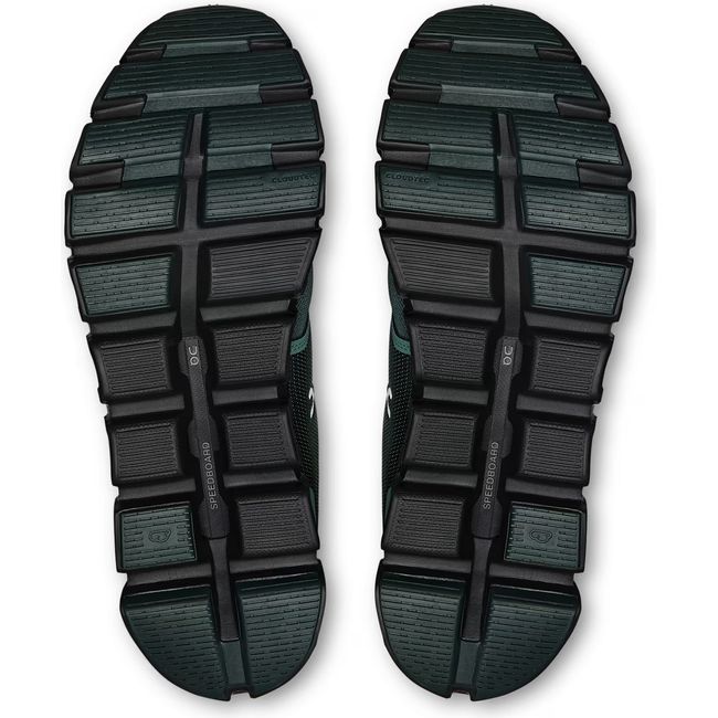 Soles of Men's On Running Cloud 6 Running Shoes in evergreen black with hollow cloud pods for impact