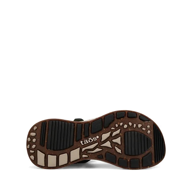 Rugged black sole of Women's Taos Super Side Sandal in Olive Emboss upper