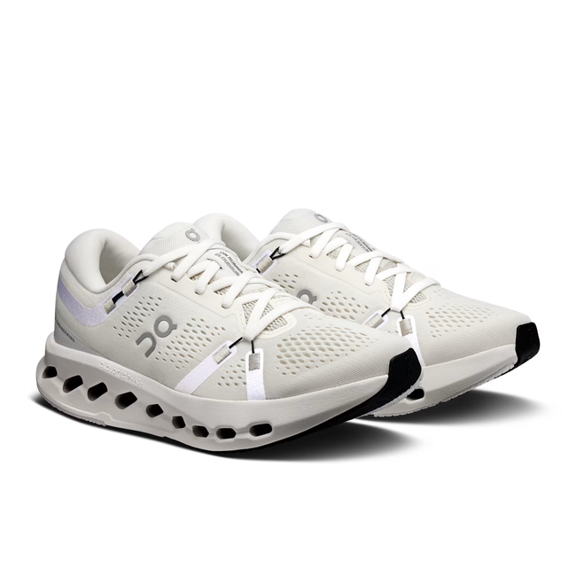 Angled Pair of On Running Women's Cloudsurfer 2 Running Shoe in ivory Creme