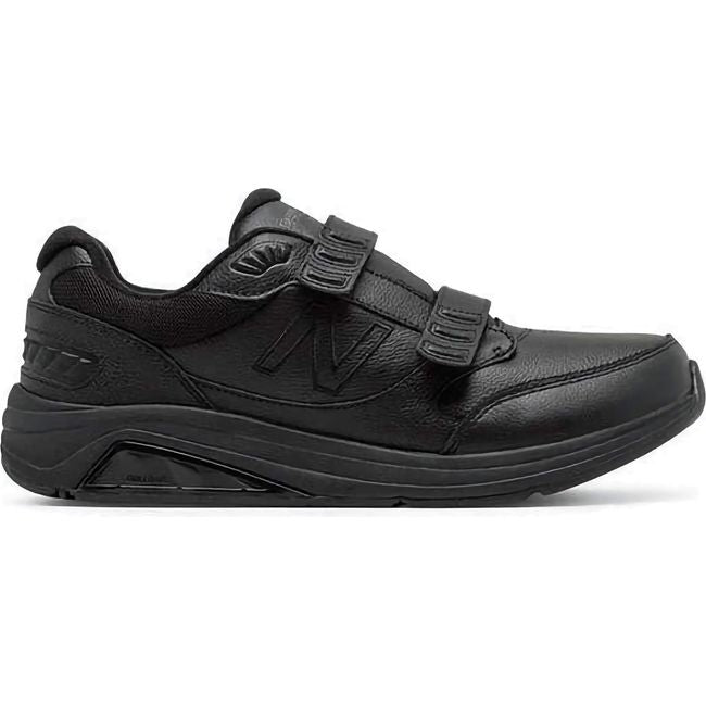 Lateral side of Black New Balance Men's 928 Stability Walking Shoe Velcro with Rollbar