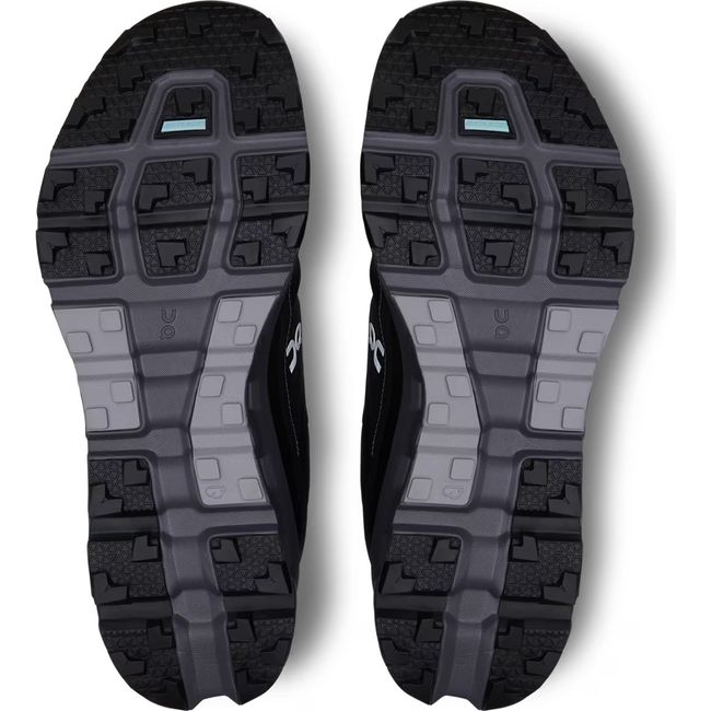 Soles of On Running Men&#39;s Cloudvista 2 Waterproof Trail Running Shoes in all black