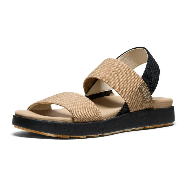 Front angled view of Women's KEEN Elle Backstrap Sandal in tan cornstalk black colorway