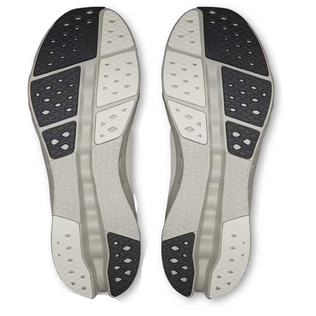 Soles of On Running Men's Cloudsurfer 2 Running Shoe in Ivory Iceberg