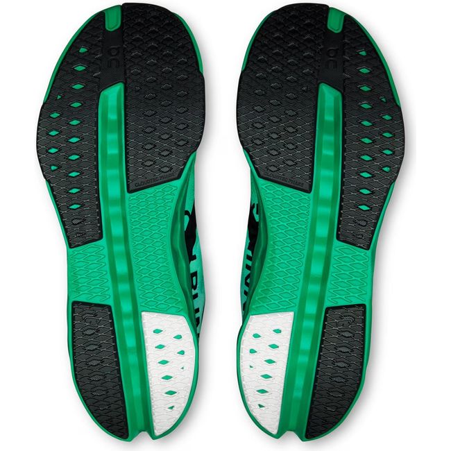 Soles of Men's On Running Cloudsurfer Next Running Shoes in Mint Green and Black
