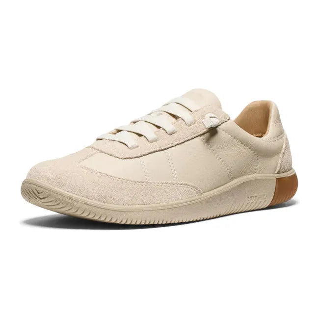 Front angled view of Men's slip on KEEN KNX T-Toe Sneaker in Birch Plaza Taupe