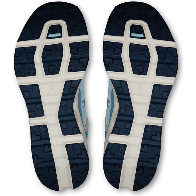 Soles of Women's On Running Cloudvista 2 Trail Running Shoes in Cream Horizon Blue with black grip