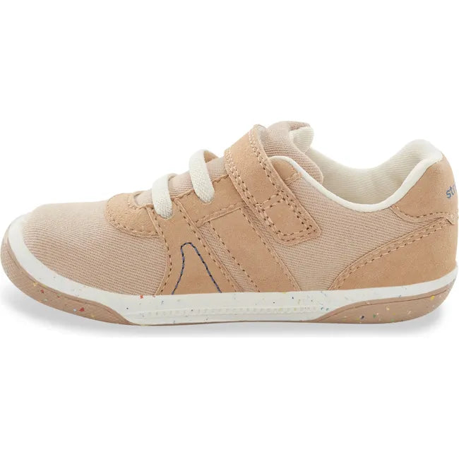 Medial side of Kids Stride Rite Fern Sneaker in camel tan color with a velcro strap
