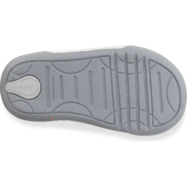 Sole of Kids Stride Rite Fern Sneaker in gray with a velcro strap