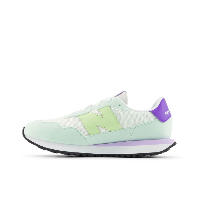 New Balance Kids' 237 Bungee Lace shoe in white and green, medial view.