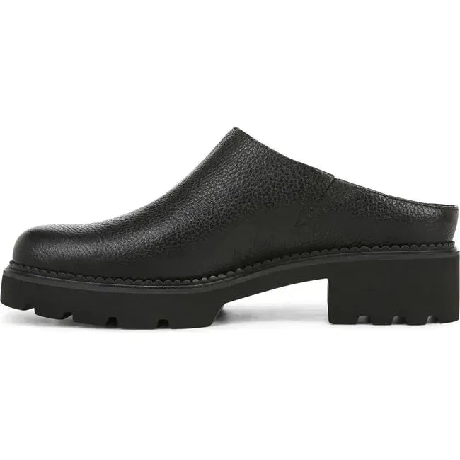 Medial side of Women's Vionic Fairfax Mule in all black leather with a block heel