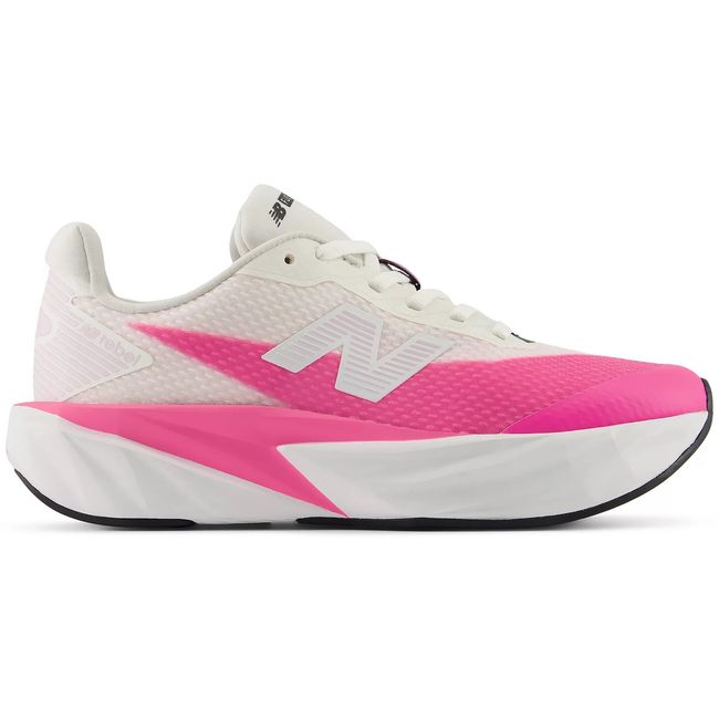New Balance FuelCell kids running shoe in cream with hot pink overlays