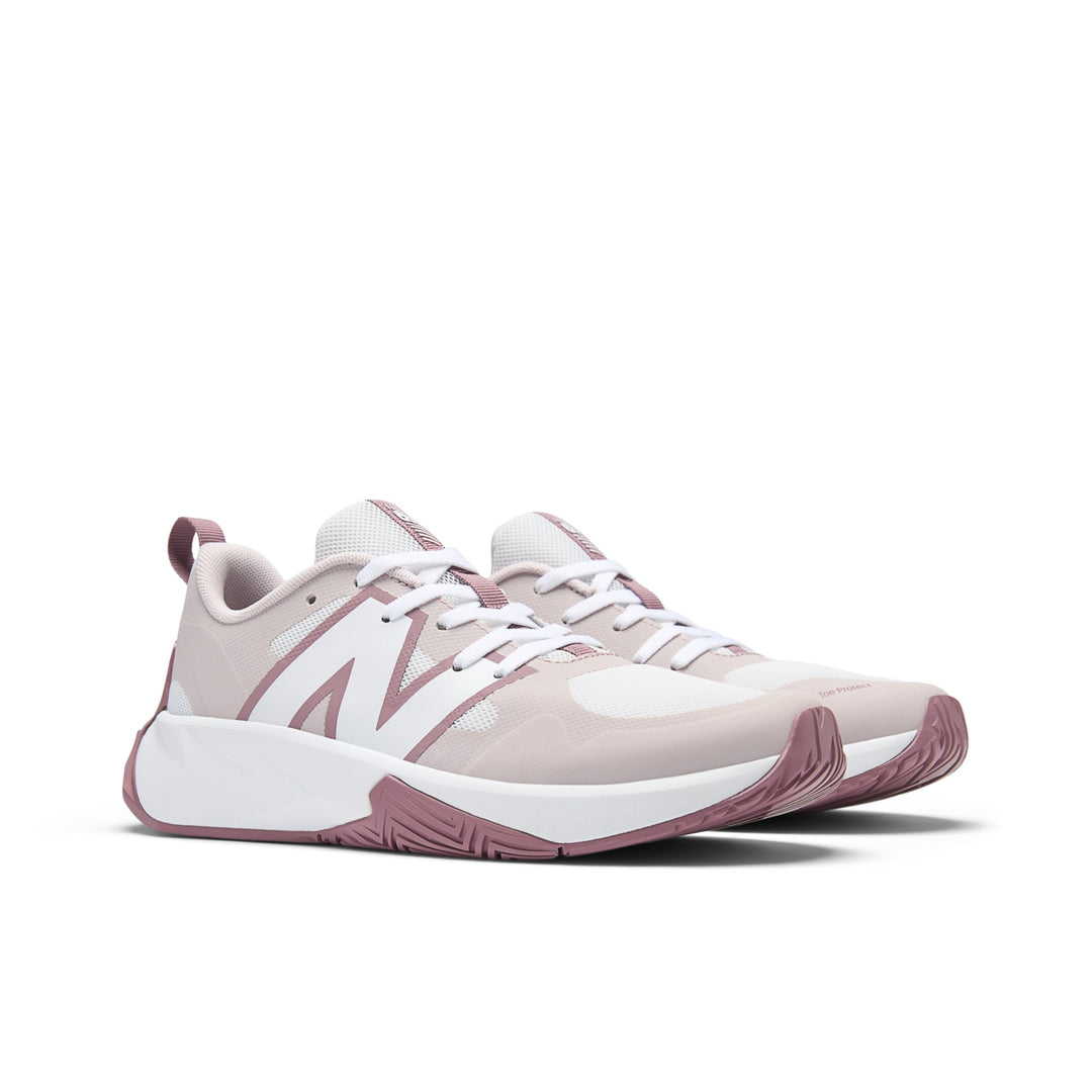 New Balance Kids' FuelCell Play Lace Running Shoe (Youth) in White/Stone Pink/Rosewood, three-quarter front view
