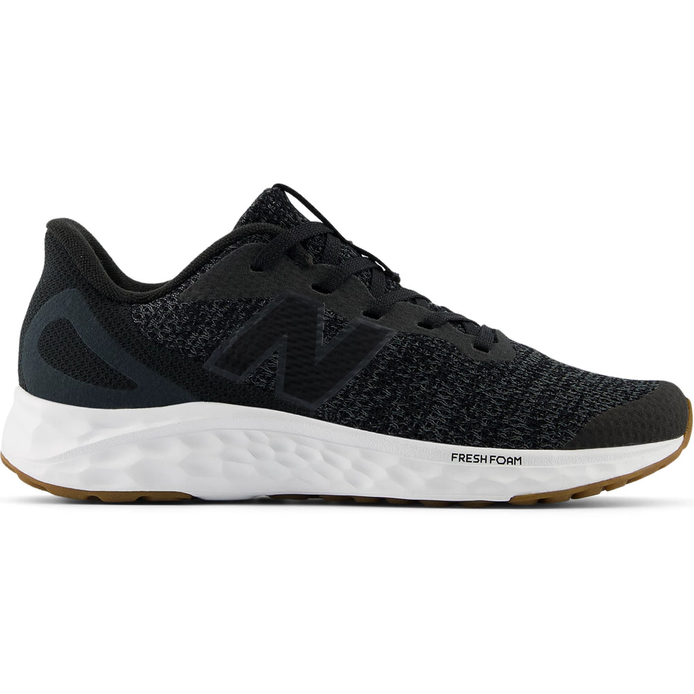 Side of New Balance Kids' Fresh Foam Arishi v4 running shoe in Black/Phantom