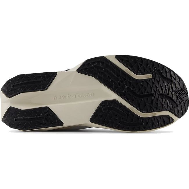 Sole of New Balance Big Kids' FuelCell Propel V5 Running Shoe in White Black and Linen