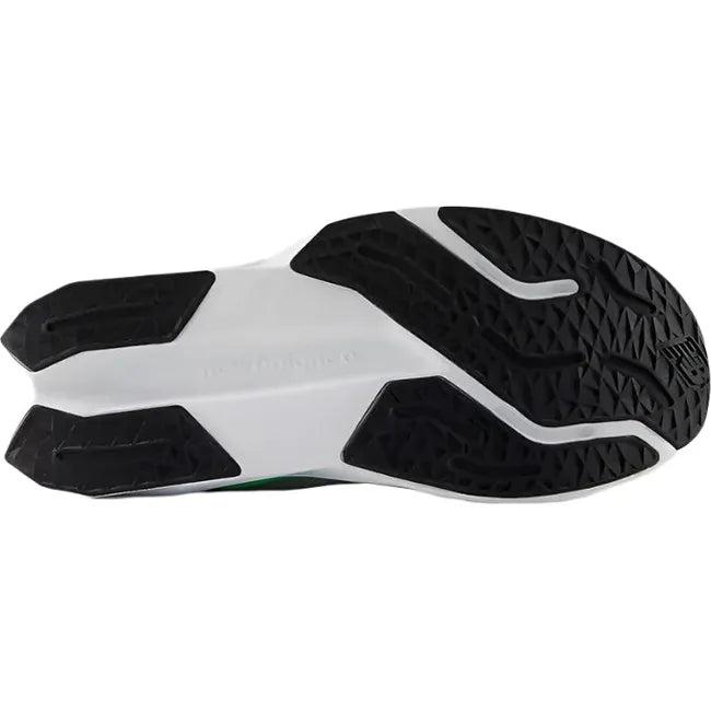 White sole of New Balance Kids' FuelCell Propel V5 Running Shoe in gray with blue and green accents