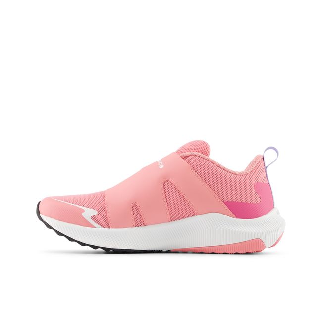 Medial profile of the New Balance Reveal v4 BOA in rose pink with a white midsole