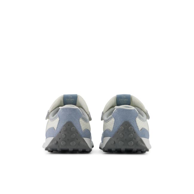 Rear heel view of the New Balance baby 327 pair in pale blue and grey