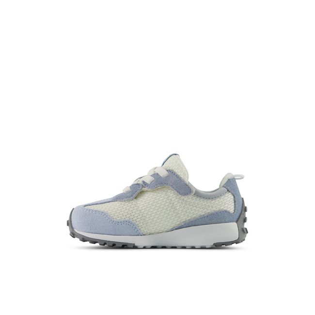 Medial profile of the New Balance baby 327 in pale blue suede and cream mesh