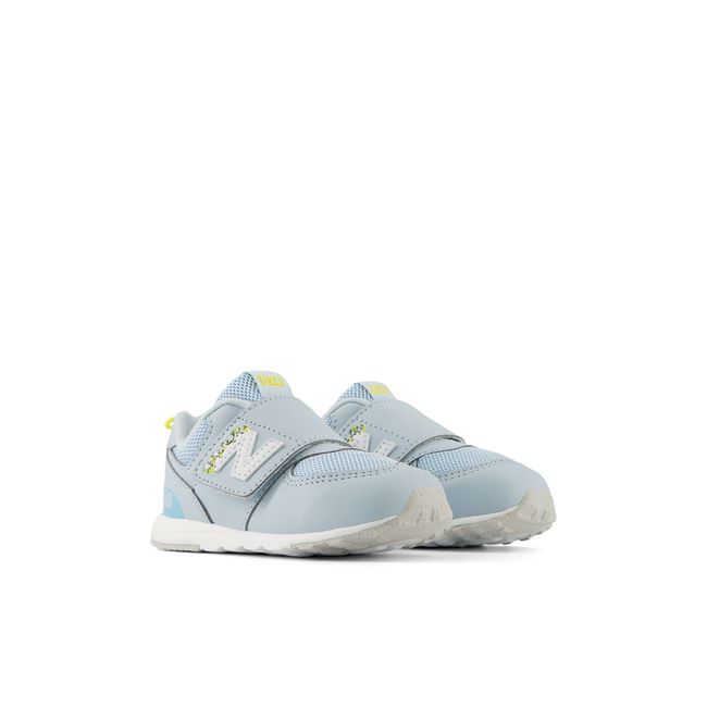 New Balance 574 New-B kids sneakers in bright blue, top-down pair view.