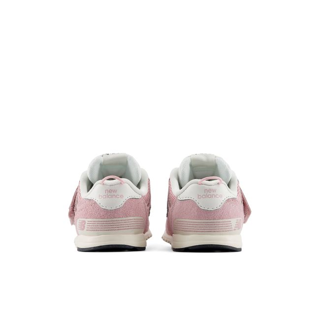 Rear heel view of the New Balance baby 574 pair in soft pink and cream
