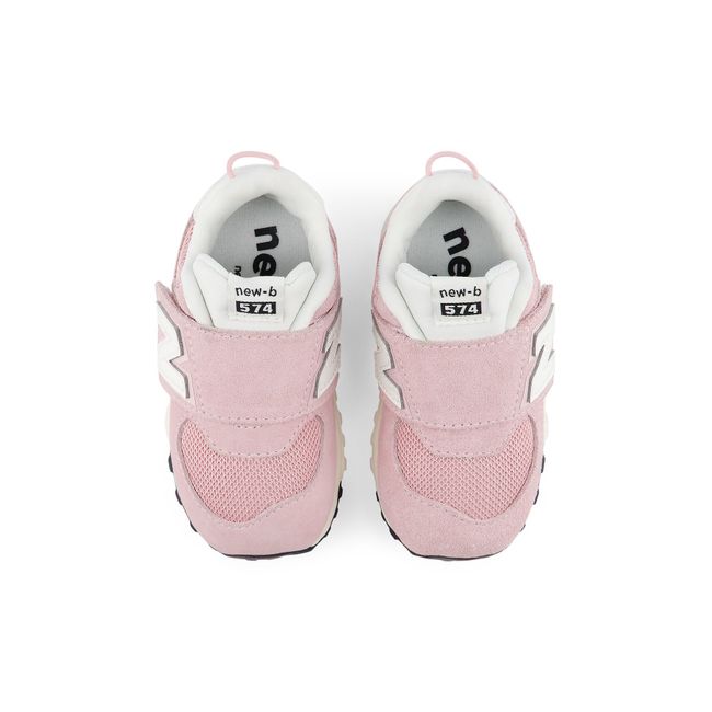 Top down view of the New Balance baby 574 pair showing the wide strap opening