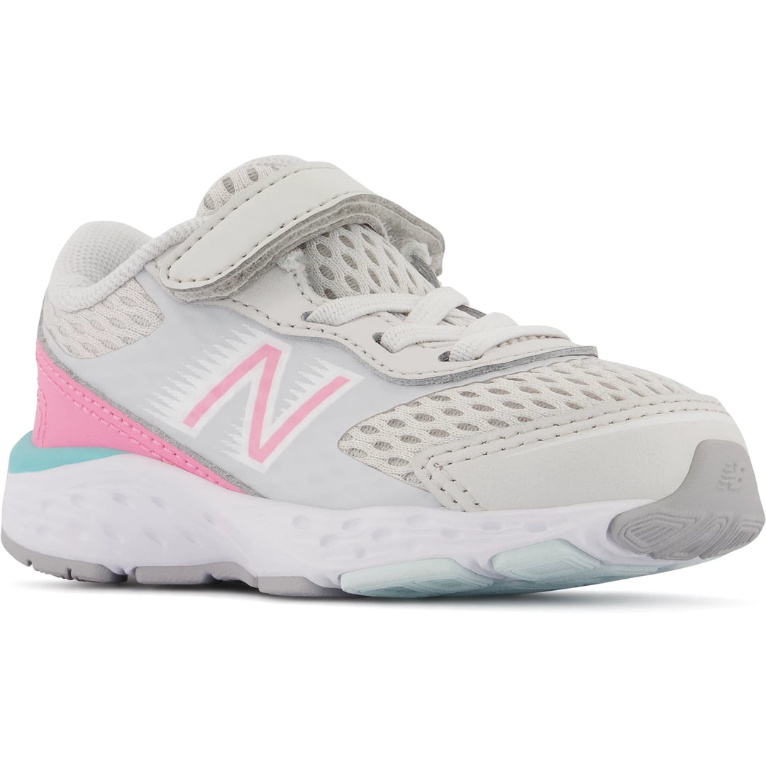 Front angle of New Balance Kids' 680v6 running shoe in Nimbus Cloud/Bubblegum/Surf