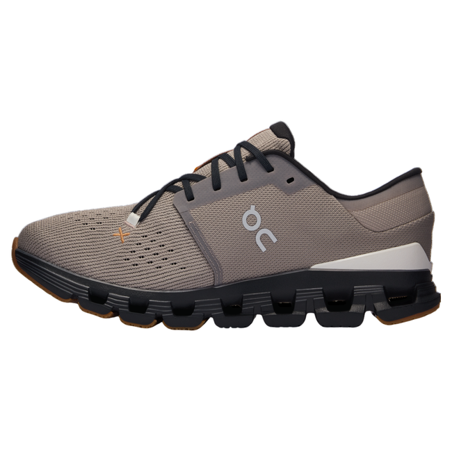 Medial side of men&#39;s On Cloud X 4 sneakers in grayish brown with black and copper accents