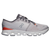 Lateral side of men's On Cloud X 4 sneakers in gray with pops of orange and black.