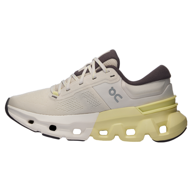 Medial side of On Cloud Cloudflyer 5 running shoes in cream with half white, half yellow midsole