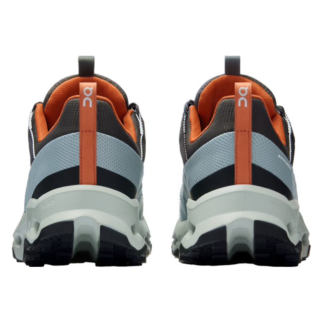 Heels of a blue On Running On Cloud Cloudhorizon Waterproof trail running shoe with orange accents