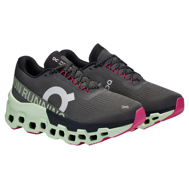 Pair of On Running On Cloud Cloudmonster 2 running shoe in charcoal gray and green with pink accents