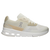 Lateral side of Women's On Cloud Cloudrift Shoe in beige and white