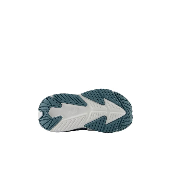 New Balance Rave Run V2 infant shoe rubber outsole in salt water teal showing flexible traction pattern