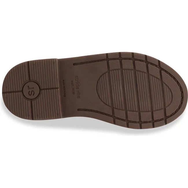 Sole of the Kids Lizz Stride Rite Boots. Tall boot in brown leather with brown rubber sole