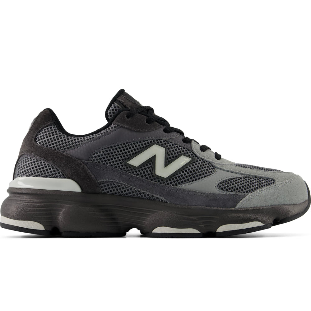 Side of New Balance Men's 603 sneaker in Black/Magnet