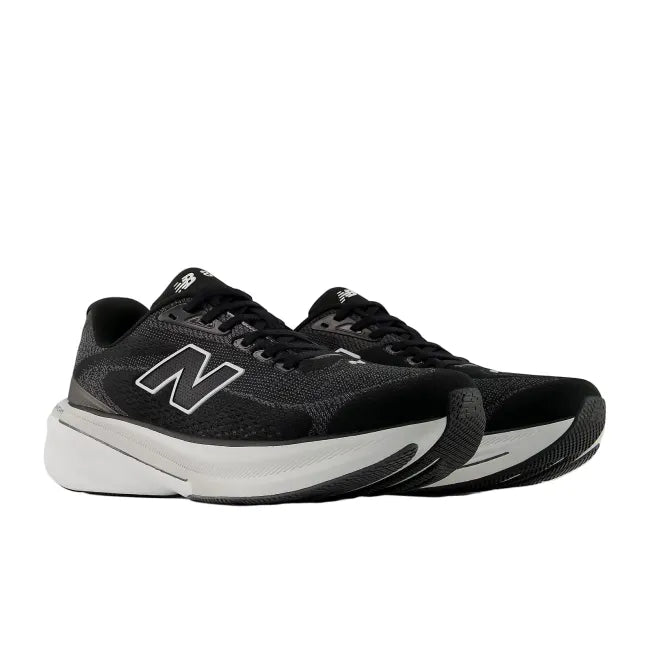 Side profile of New Balance 860 V15 men's running shoe in black showing rocker profile and cushioned midsole