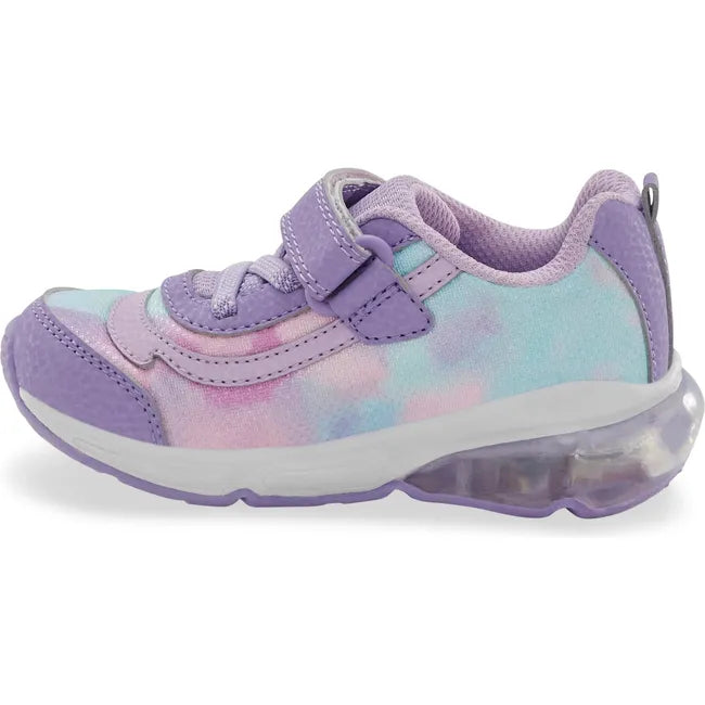 Medial side of Little Kids' Stride Rite Surge Bounce Light Up Sneaker in Lilac with velcro strap