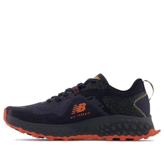 Medial side of New Balance Men's Fresh Foam X Hierro V7 Trail Running Shoe in Thunder Vibrant Orange
