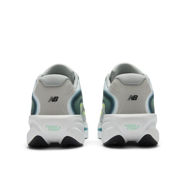 Rear heel view of the New Balance Ellipse pair in grey and teal