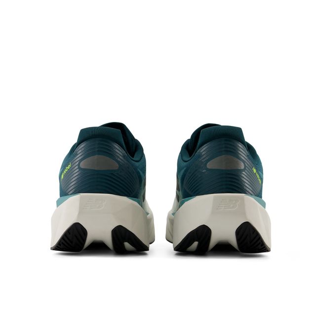 New Balance FuelCell Rebel V5 running shoe in green, heel view.