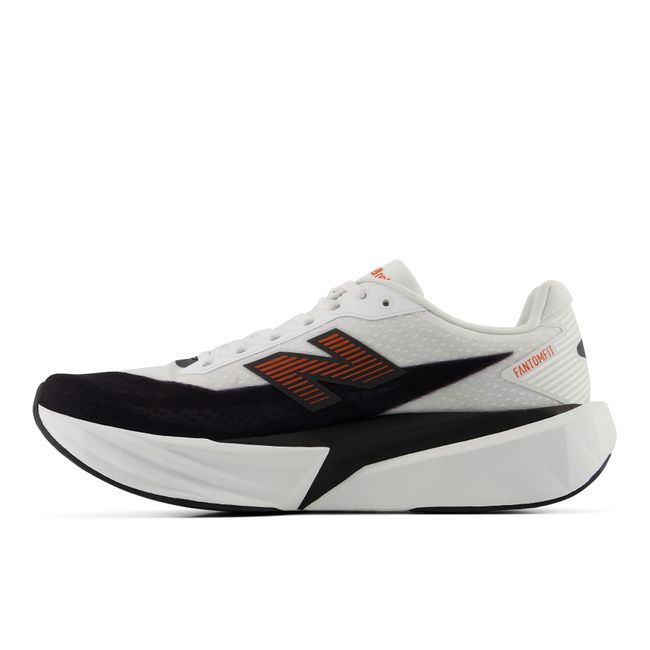Medial profile of New Balance Men's FuelCell Rebel V5 in white and neon orange-red