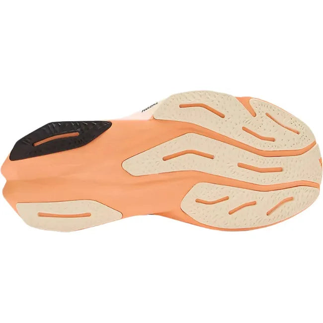 Sole of New Balance Men's FuelCell Rebel V4 Running Shoe in hot mango orange